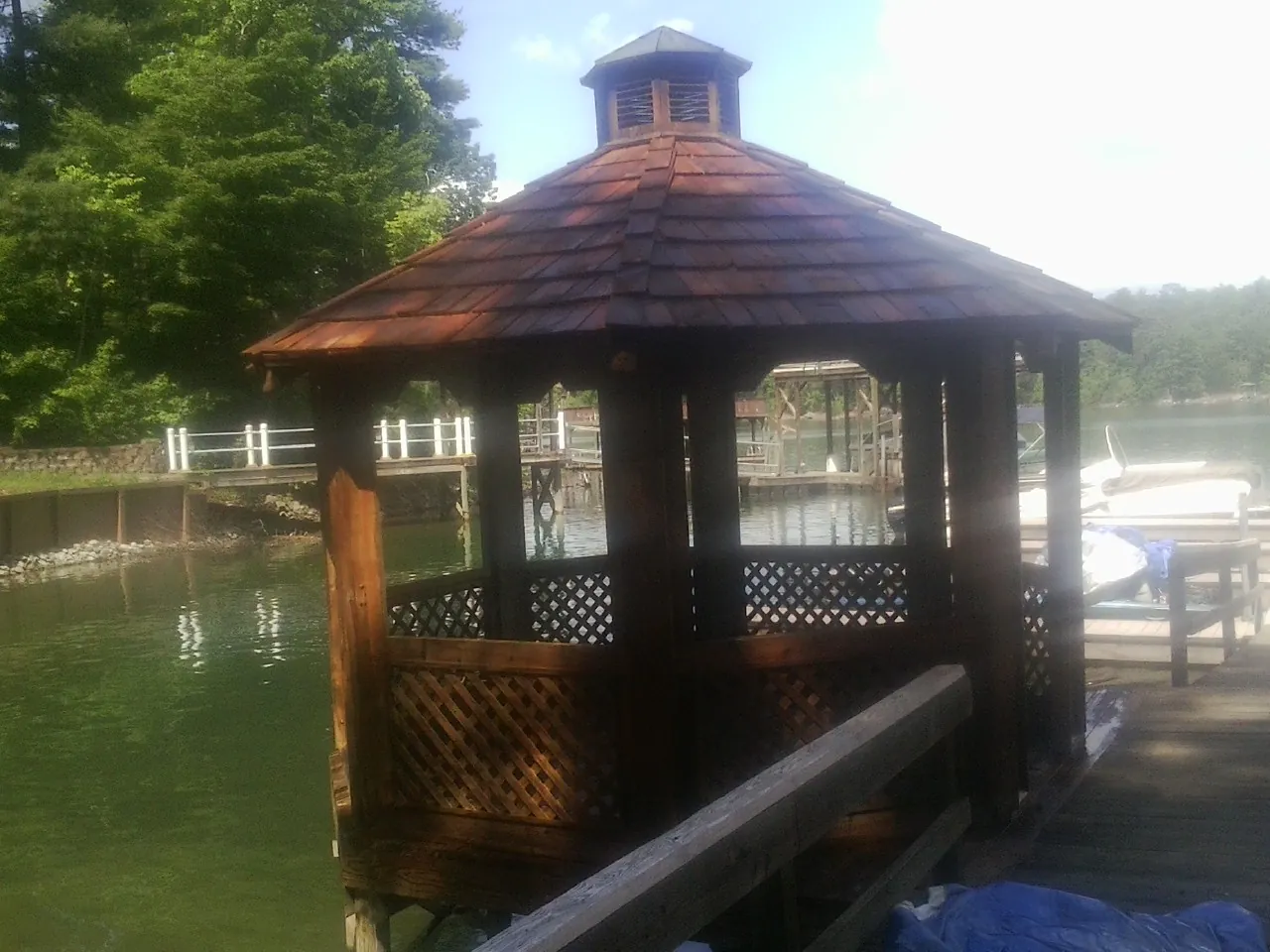 Cedar shake gazebo roof rebuilt on a lake dock in Ewa Beach